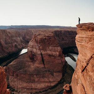 Preview wallpaper canyon, cliff, man, alone