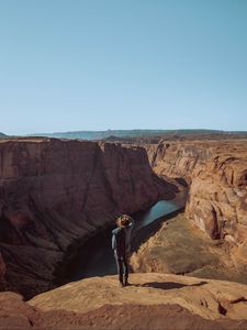 Preview wallpaper canyon, man, cliff, river, view
