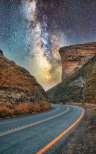 Preview wallpaper canyon, road, rocks, nebula, starry sky