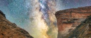 Preview wallpaper canyon, road, rocks, nebula, starry sky