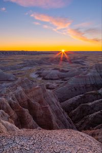 Preview wallpaper canyon, rocks, dry, cranny, sun, sunset