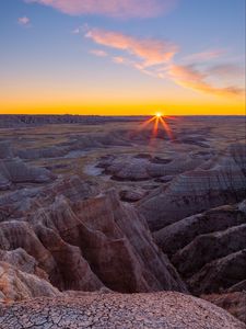 Preview wallpaper canyon, rocks, dry, cranny, sun, sunset