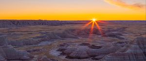 Preview wallpaper canyon, rocks, dry, cranny, sun, sunset