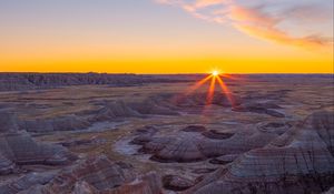 Preview wallpaper canyon, rocks, dry, cranny, sun, sunset