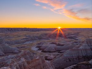 Preview wallpaper canyon, rocks, dry, cranny, sun, sunset