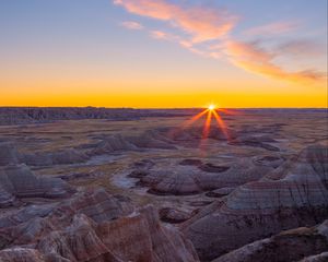 Preview wallpaper canyon, rocks, dry, cranny, sun, sunset