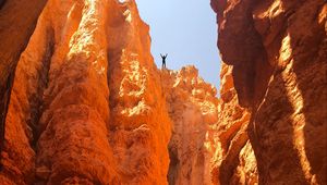 Preview wallpaper canyon, rocks, man, freedom, sand