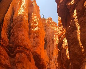 Preview wallpaper canyon, rocks, man, freedom, sand