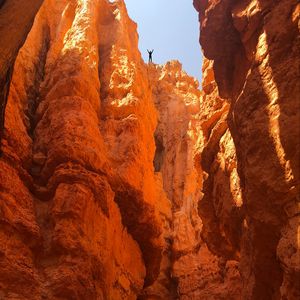 Preview wallpaper canyon, rocks, man, freedom, sand