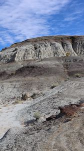 Preview wallpaper canyon, rocks, mountains, slope, hills, sky