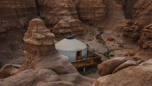 Preview wallpaper canyon, valley, building, rocks, sandy