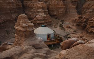 Preview wallpaper canyon, valley, building, rocks, sandy