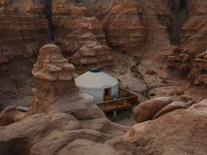 Preview wallpaper canyon, valley, building, rocks, sandy