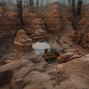 Preview wallpaper canyon, valley, building, rocks, sandy