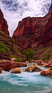 Preview wallpaper canyon, water, stones, rocks, sky