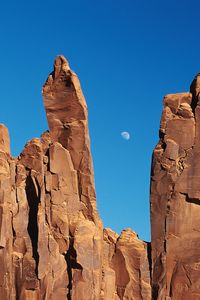 Preview wallpaper canyons, rocks, moon, sky, crack