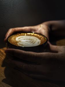 Preview wallpaper cappuccino, coffee, mug, hands, glitter