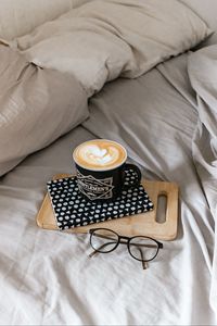 Preview wallpaper cappuccino, cup, glasses, book, bed