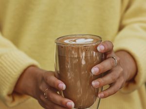 Preview wallpaper cappuccino, drink, glass, hands, girl