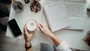 Preview wallpaper cappuccino, mug, hands, table, work, aesthetics