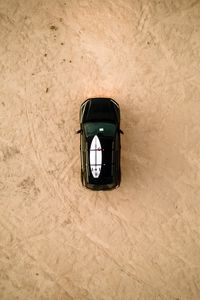 Preview wallpaper car, beach, aerial view, surfboard, black