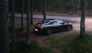 Preview wallpaper car, black, forest, trees