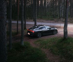 Preview wallpaper car, black, forest, trees