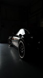 Preview wallpaper car, black, garage, darkness