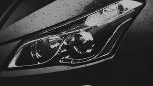 Preview wallpaper car, black, headlight, drops, wet