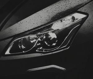 Preview wallpaper car, black, headlight, drops, wet