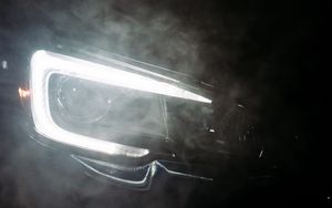 Preview wallpaper car, black, headlight, light, smoke