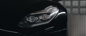 Preview wallpaper car, black, headlight, front view, parking