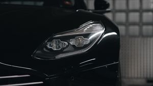 Preview wallpaper car, black, headlight, front view, parking