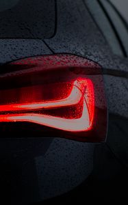 Preview wallpaper car, black, wet, taillight, backlight