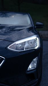 Preview wallpaper car, black, wet, headlights, front view