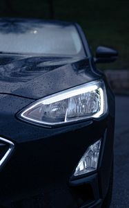 Preview wallpaper car, black, wet, headlights, front view