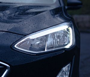 Preview wallpaper car, black, wet, headlights, front view