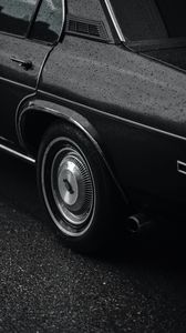 Preview wallpaper car, black, wet, wheel, side view