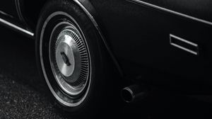 Preview wallpaper car, black, wet, wheel, side view