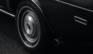 Preview wallpaper car, black, wet, wheel, side view