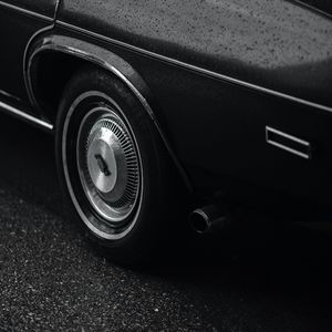 Preview wallpaper car, black, wet, wheel, side view