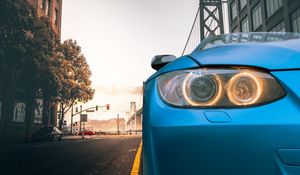 Preview wallpaper car, blue, headlight, road