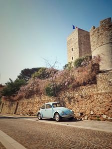 Preview wallpaper car, blue, retro, tower, architecture