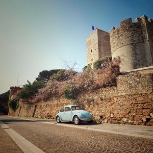 Preview wallpaper car, blue, retro, tower, architecture