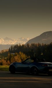Preview wallpaper car, blue, sports car, convertible, mountains