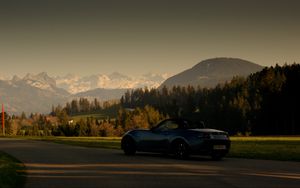 Preview wallpaper car, blue, sports car, convertible, mountains