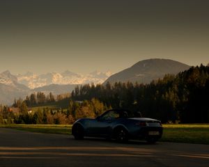 Preview wallpaper car, blue, sports car, convertible, mountains