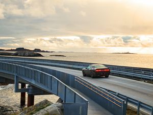 Preview wallpaper car, bridge, road, sea