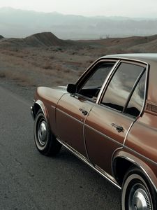 Preview wallpaper car, brown, retro, road, mountains