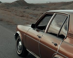 Preview wallpaper car, brown, retro, road, mountains